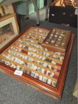 Two display cases and contents of thimbles.