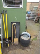 Various plastic garden planters, sorting trays, forks and fence post digger.