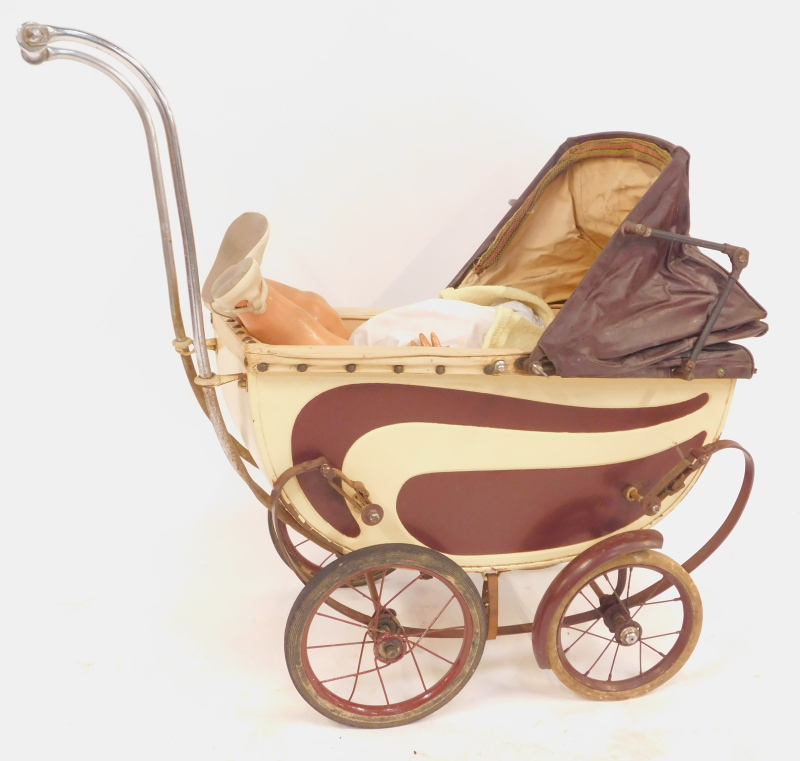 A vintage doll's pram, steel framed with cream and brown painted decoration, and a painted papier - Image 3 of 5