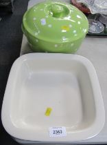 A Spode Baking Days black spotted ceramic serving dish, and a Spode Baking Days lime green spotted