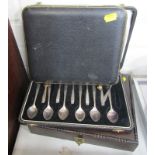 Silver plated cutlery, comprising cased set of cake forks, serving spoons and a knife set. (3)