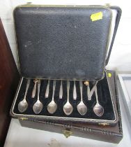 Silver plated cutlery, comprising cased set of cake forks, serving spoons and a knife set. (3)