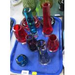 Various Art Glass vases, each on domed foot, comprising amethyst red and blue glass finishes, two