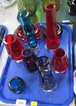 Various Art Glass vases, each on domed foot, comprising amethyst red and blue glass finishes, two