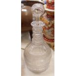 A Regency triple ring neck cut glass mallet shaped decanter, with slice cut shoulders and hobnail