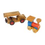 Wooden toys, comprising model of an early 20thC motor car, with tyres marked HEROS, 21cm long,
