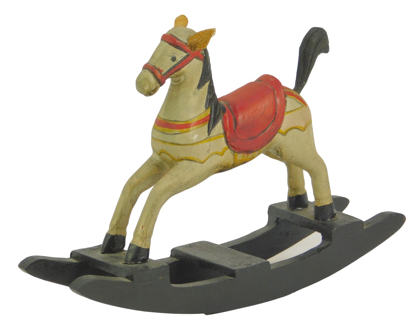 A miniature rocking horse, with red seat on painted white horse, 9cm high.