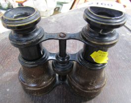 A set of opera glasses, with leatherette finished stems.
