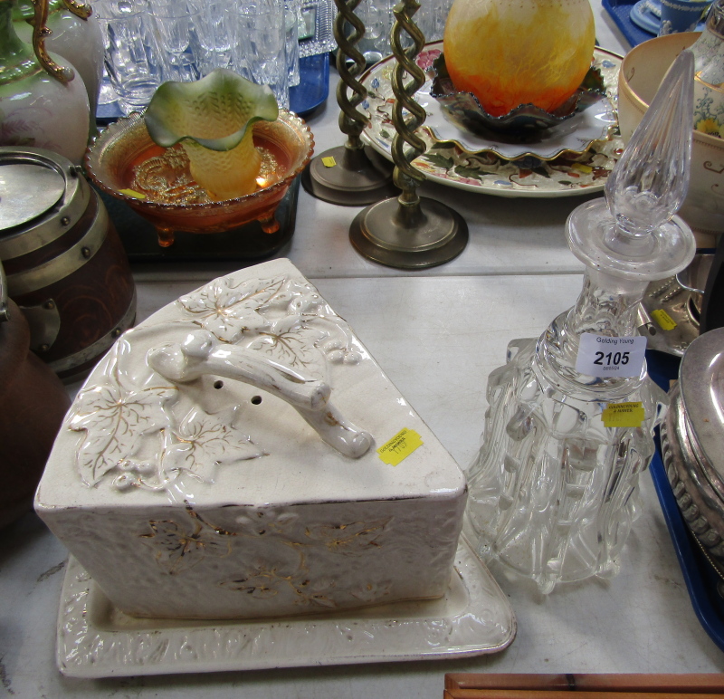 A ceramic cheese dish, on a white ground with raised grape vines. (2)