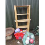 A pine storage rack, clothes rail, various shovels, buckets, footballs, etc. (a quantity)