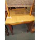 A melamine topped extending kitchen table.