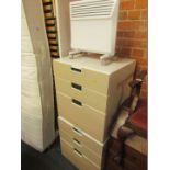 A pair of three drawer bedsides, each of white finish with beech effect front, and a panel