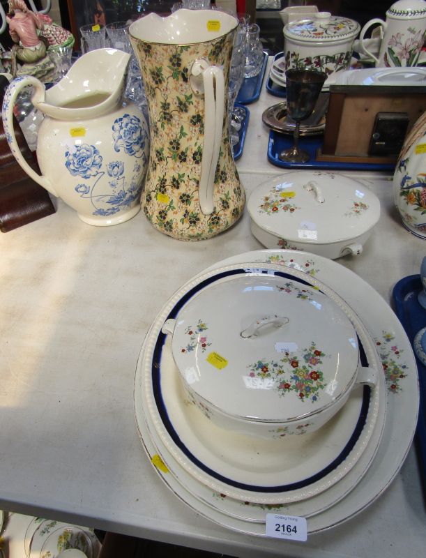 Meat plates, two floral tureens and lids, two water jugs. (a quantity)