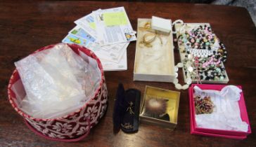 Assorted costume jewellery, first day covers, necklaces, etc. (1 tray)