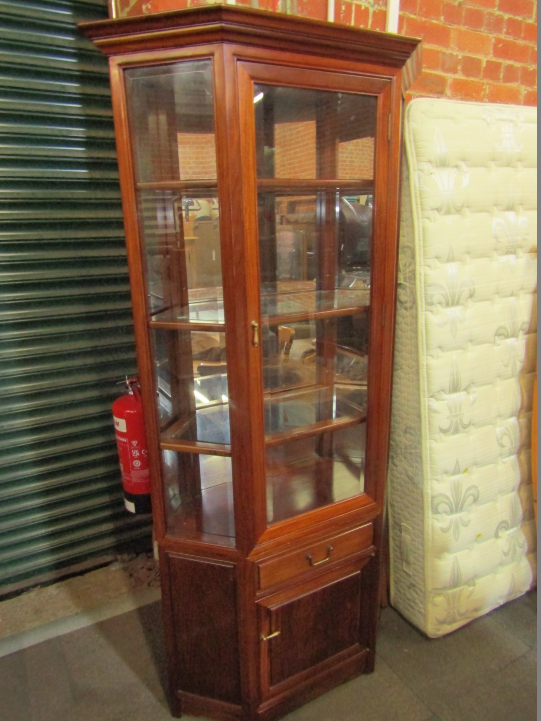 A Bright's of Nettlebed 20thC mahogany display cabinet.
