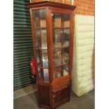 A Bright's of Nettlebed 20thC mahogany display cabinet.
