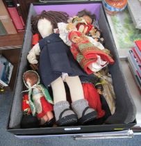 Eastern inspired dolls, comprising a ragdoll in school girl's uniform, Portuguese and Spanish