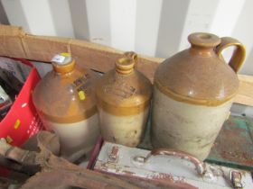 Three stoneware bottles, comprising Warwicks of Newark, Diokins and Co of Newark, and another