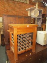 A beech kitchen island, and a wine bottle rack. (2)