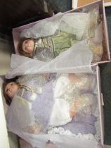 Two Leonardo Collection porcelain dolls, boxed.