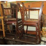 A set of four mahogany dining chairs, each with upholstered drop in seats.¦The upholstery in this