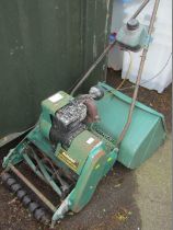 A Qualcast Suffolk Punch 35S petrol mower.