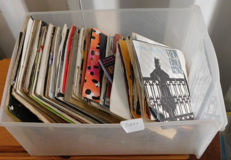 A group of 45rpm vinyl singles, including Kim Wilde, Marty Wilde, Whitesnake, The Who, Wings,