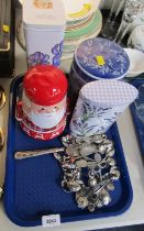 Kitchenalia, comprising souvenir spoons, and three metal storage tins. (1 tray)