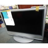 A Sony television, with silvered rim, model KDL-S40A12U, with remote.
