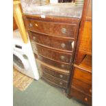 A reproduction mahogany bow front chest of seven drawers, on out splayed legs.