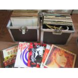 Two aluminium and black finish records cases and contents of 33rpm records, including Mariah