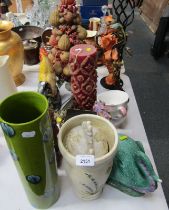 Various ceramics, comprising hen ornament, candle, two floral candle stands, dragon ornament,