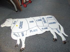 A modern painted metal cow meat sectional picture.