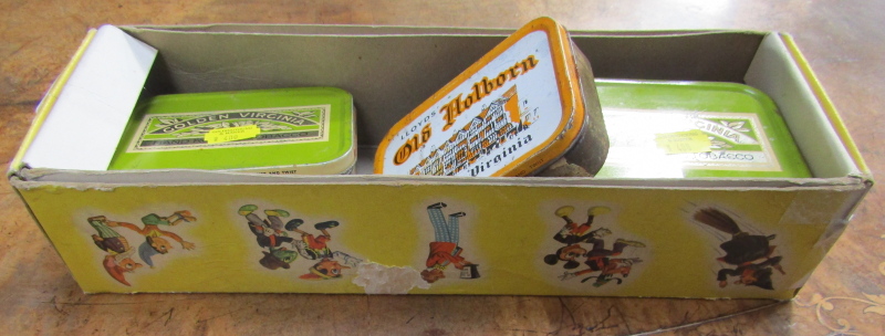 Various Golden Virginia tobacco tins and a Pelham puppet box.