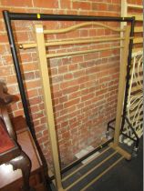 A black finish clothes rail, and a gold finish three branch clothes rail. (2)