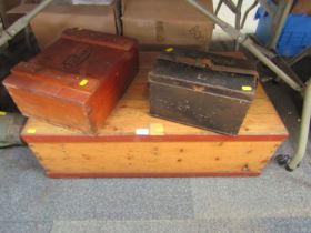 A pine tool chest, lacking contents, together with a Parkers sweet box and a black metal tin.
