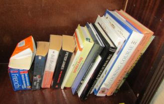 A group of books, including Cooking Course, Peter Jones, Bill Bryson, Spanish and French