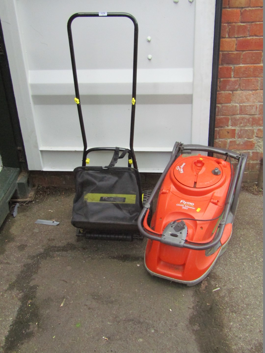 A Flymo 380 electric mower and a Challenge hand push cylinder mower, model GT5614. (2)