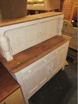 A painted oak dresser, the two cupboard top above arrangement of two drawers and two cupboards, on