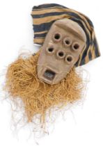 Tribal Art. Grebo/Kru/Krou tribe, a tubular face mask with six eyes worn, collected from village nea