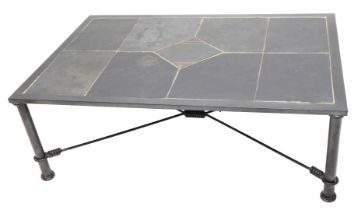 A wrought iron coffee table, the rectangular top inset with slate panels, on cylindrical legs, 119cm