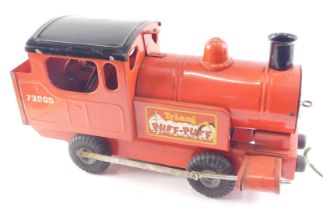 A Tri-ang Puff Puff red toy train, 47cm long overall.