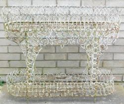 A 19thC wirework rectangular two tier plant stand, 101cm wide. (AF)