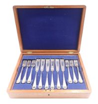 A 19thC silver plated fish serving set, each with white cut detail, in mahogany brass bound case, 8c