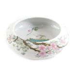 A Chinese famille rose shallow bowl, decorated with birds on flowering branches, etc., red seal type