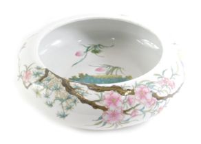 A Chinese famille rose shallow bowl, decorated with birds on flowering branches, etc., red seal type