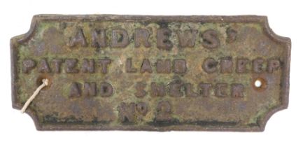 A cast iron rectangular railway plaque, stamped Andrew's Patent Lamb Creep and Shelter No. 2, 18cm w