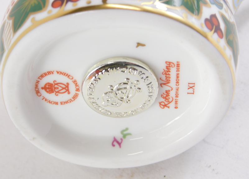 A Royal Crown Derby Robin Nesting paperweight, dated 1997, with silver stopper, 7cm high. - Image 2 of 2