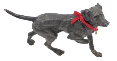 A late 19th/early 20thC spelter figure of a hound, in the manner of Mene, 27cm long. (AF)
