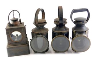 A collection of four railway lamps, for British Rail North, LNER, LMS, etc.